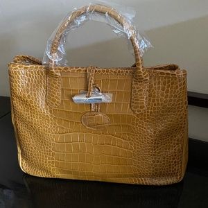 Two Longchamp Embossed Leather Totes
